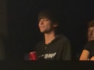 Louis Tomlinson spotted at Zayn Malik concert