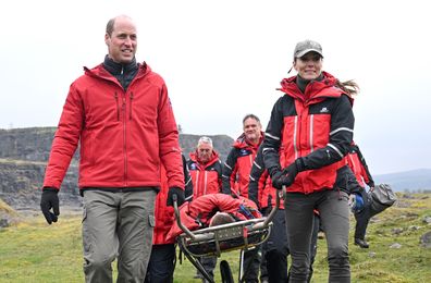 MERTHYR TYDFIL, WALES - APRIL 27: Prince William, Prince of Wales and Catherine, Princess of Wales take part in medical support exercises at the Central Beacons Mountain Rescue during day one of their visit to Wales on April 27, 2023 in Merthyr Tydfil, Wales. The Prince and Princess of Wales are visiting the country to celebrate the 60th anniversary of Central Beacons Mountain Rescue and to meet members of local communities. (Photo by Matthew Horwood - WPA Pool/Getty Images)