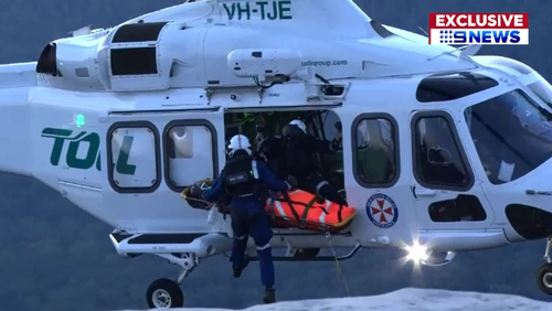 Issac suffered multiple broken bones and was winched to safety by a rescue helicopter after falling off a cliff edge in the NSW Blue Mountains.