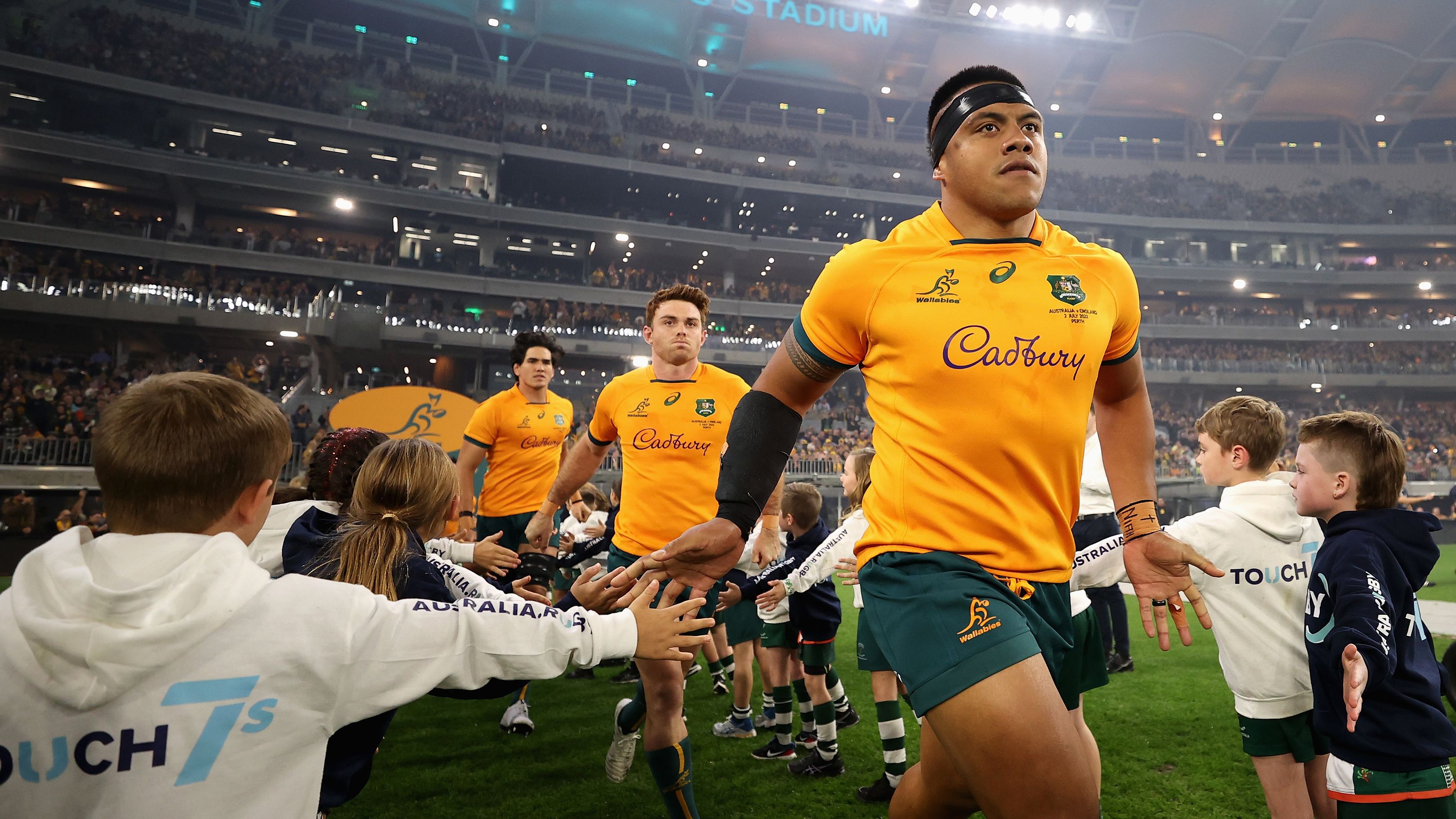 Allan Alaalatoa of the Wallabies runs onto the field.