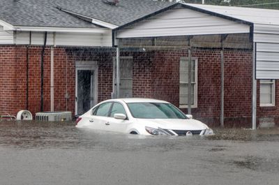 Heavy flooding is seen in Latta, South Carolina.