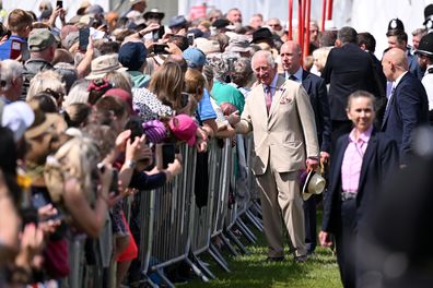 King Charles III greets well wishers during his visit to Sandringham Flower Show at Sandringham House on July 26, 2023 in King's Lynn, England.  