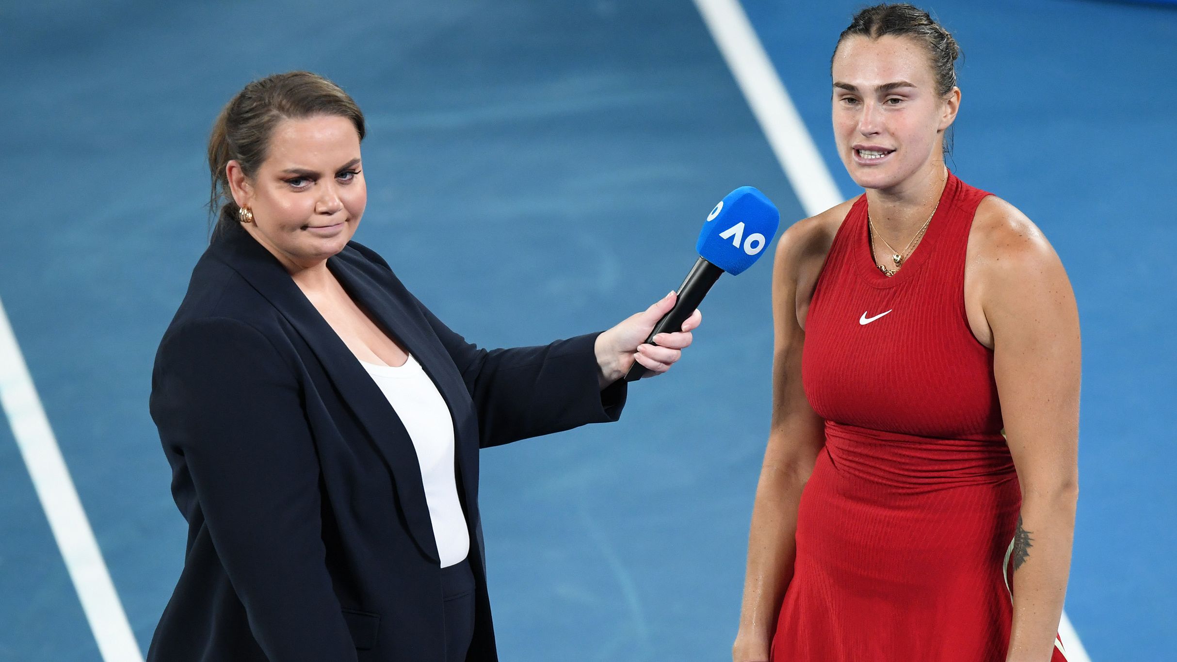 Jelena Dokic interviews Aryna Sabalenka after her win.