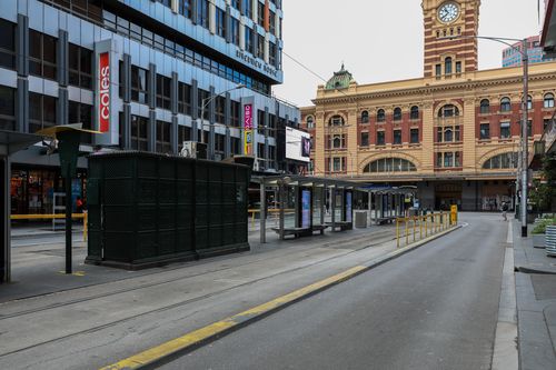 MELBOURNE, AUSTRALIA - SEPTEMBER 18: A deserted Elizabeth Street tram stop near Flinders Street station on September 18, 2021 in Melbourne, Australia. Anti-lockdown protests have been planned in Melbourne despite current COVID-19 restrictions prohibiting large outdoor gatherings. Victoria police are shutting down the public transport network in the CBD in a bid to discourage protestors. Metropolitan Melbourne is currently subject to lockdown restrictions as health authorities work to contain the