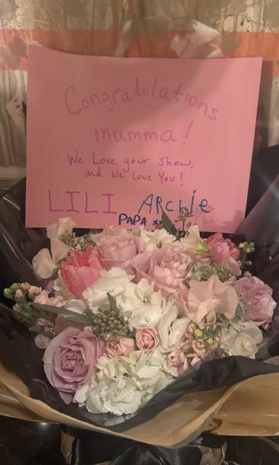 Flowers and a card from Prince Harry, Prince Archie and Princess Lilibet congratulating Meghan on the launch of With Love, Meghan.