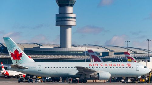 An Air Canada flight almost landed on four taxiing planes as a US airport. (Getty)