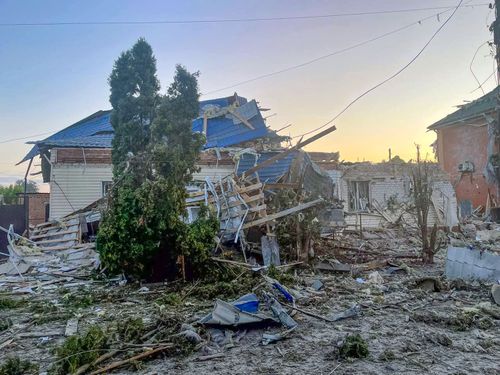 damaged house after shelling by the Ukrainian side in the city of Sudzha, Kursk region that borders Ukraine, Tuesday, Aug. 6, 2024.  