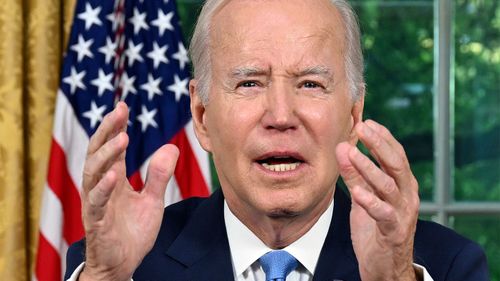 Joe Biden has celebrated the passage of a deal that would avert a global financial crisis.