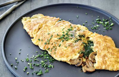Pan fried mushroom omelette with spinach and thyme