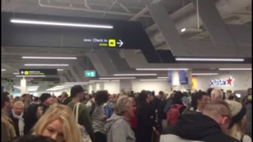 Passengers at Melbourne Airport have been unable to check-in for their flights due to the outage. (Supplied)