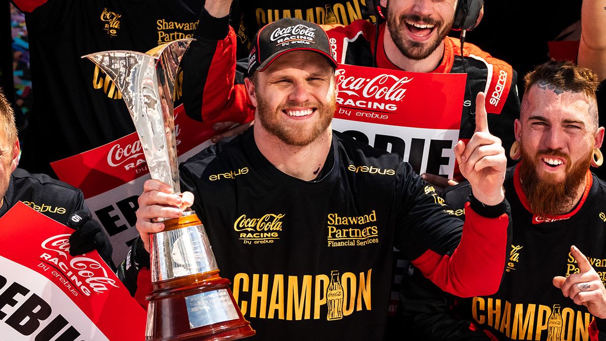 Brodie Kostecki celebrates winning the 2023 Supercars drivers&#x27; championship with his Erebus Motorsport team.