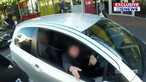 The cyclist swore at the 61-year-old driver and kicked her car. (9NEWS)