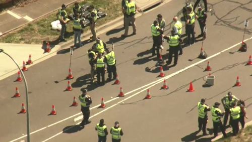 Police wait for the bikies to arrive so they can carry out checks. 