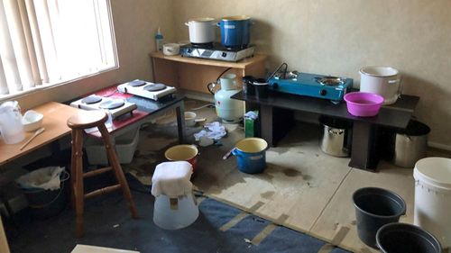 Images released by police show a small drug kitchen allegedly used by the man, consisting of a number of portable stoves and drug paraphernalia.