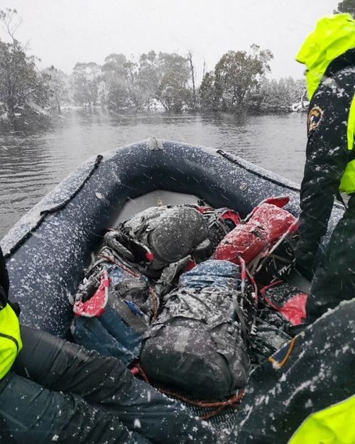 Search teams hunt for missing hiker Michael Bowman in dangerous Tasmanian weather conditions.