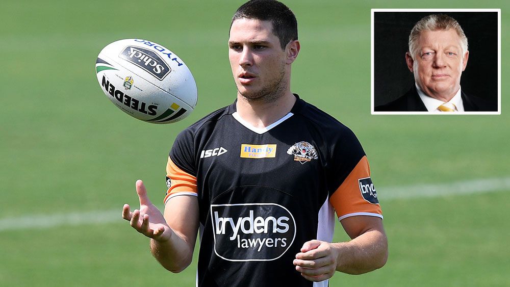 Channel Nine commentator Phil Gould (inset) and Wests Tigers five-eighth Mitchell Moses.