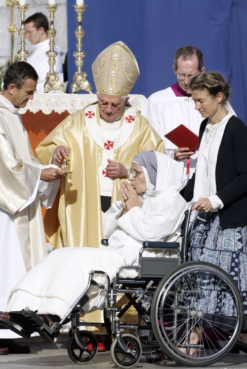 Pope Benedict XVI celebrates a special mass for the sick in front of the Basilica of the Rosary in Lourdes, France, on September 15, 2008. 
