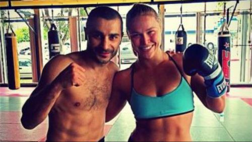 Boxing champion Vic Darchinyan with Rousey.