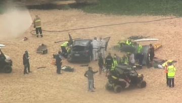 The car fell 10 metres off a cliff onto the sand of Maroubra Beach
