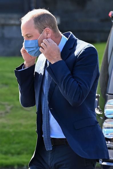 Prince William, Duke of Cambridge puts on a face mask as he meets attendees of a PSNI Wellbeing Volunteer Training course, including representatives from the Ambulance and Fire and Rescue services, to talk about mental health support within the emergency services at PSNI Garnerville on September 09, 2020 in Belfast, Northern Ireland