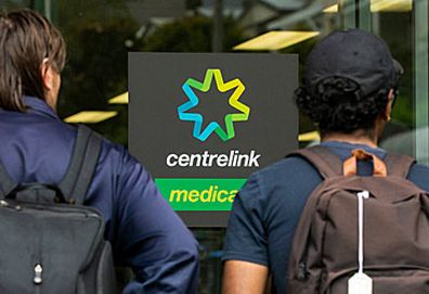 Young people outside Centrelink office (Getty)