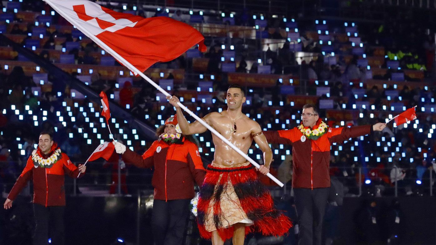 Winter Olympics: 'Shirtless' Tongan covers up as he takes to the slopes 