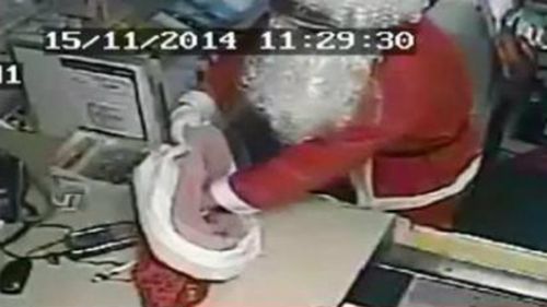 A man dressed in a Santa Claus outfit has robbed a Melbourne post office. (Supplied)
