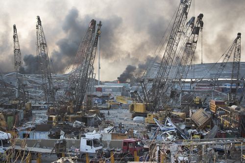 Smoke billows in the aftermath of a massive explosion in Beirut, Lebanon, Aug. 4, 2020.