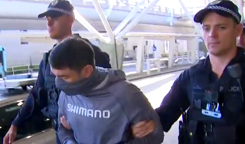 Fugitive Mark Horne arrives in Sydney after being found on Darwin yacht - 9News