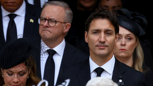 Canada's Prime Minister Justin Trudeau and Australia's Prime Minister Anthony Albanese leave Westminster Abbey after a service on the day of the state funeral and burial of Britain's Queen Elizabeth, in London, Monday Sept. 19, 2022. (Hannah Mckay/Pool Photo via AP)