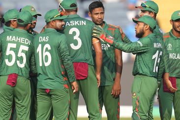 Bangladesh's Mustafizur Rahman celebrates the wicket of Australia's David Warner in 2023.