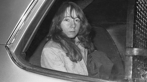Lynette Fromme sat in a U.S. Marshal's auto in Sacramento, Calif., Nov. 25, 1975, as she returned to jail when jurors in her trial recessed for the evening. 