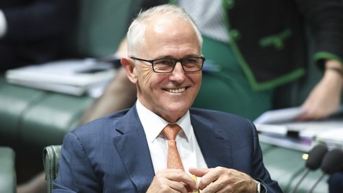 Australian Prime Minister Malcolm Turnbull reacts during House of Representatives Question Time at Parliament House in Canberra, Tuesday, March 27, 2018. (AAP Image/Lukas Coch)