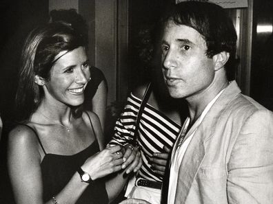 1980: Carrie Fisher and Paul Simon 