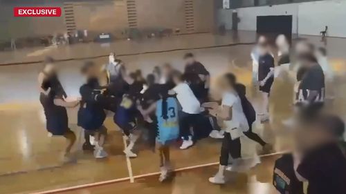 Shocking video has captured a wild brawl at a girls' basketball game in Melbourne's north over the weekend.