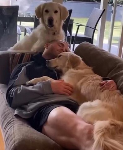 Tom Mitchell with dogs Nala and Macy 