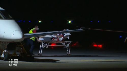 Under the cover of darkness, Jandakot airstrip turned into a makeshift emergency ward.