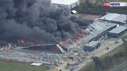 A factory fire in Eastern Creek is still burning today but has been contained by firefighters. 