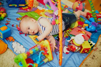 Baby on playmat