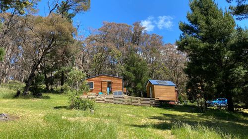 Briony Jenkinson's tiny home. Since moving in, she has added a additional tiny home as a separate space for her teenage daughter. 