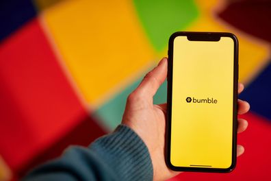 The Bumble logo shown on a smartphone.