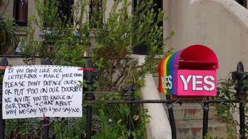The couple have no added a note to the vandals on their front fence. (Photo: Facebook)