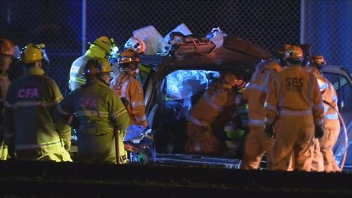 A teenage boy is fighting for life after a car he was travelling in collided with a train at a level crossing in Victoria's east.