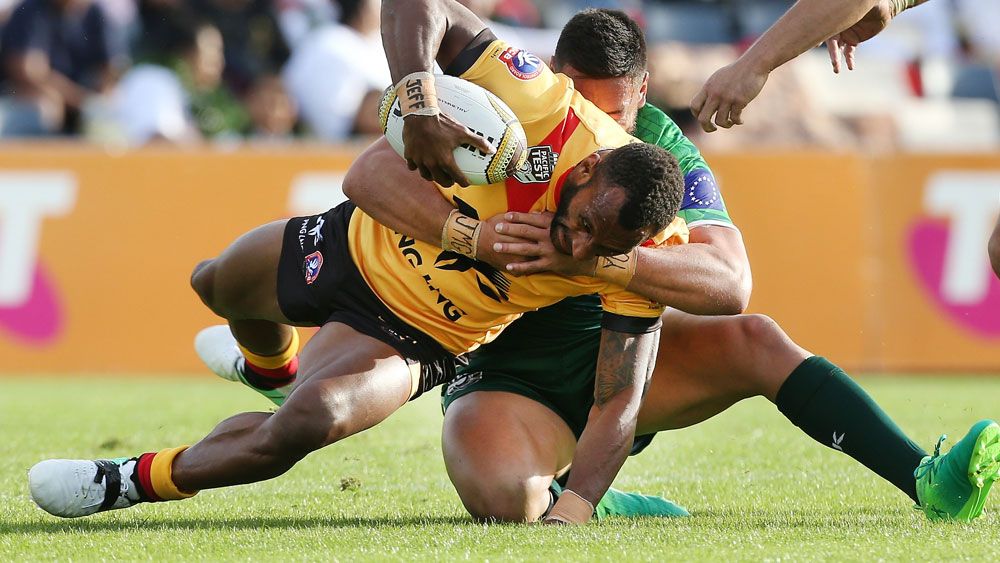 Kumuls player Stargroth Armean in action Cook Islands. (AAP)