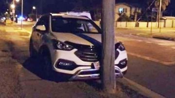 A man has allegedly chased teenagers through the streets of Townsville ending in a high-speed crash.