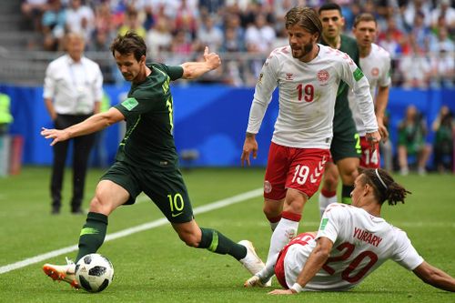 Australia's Mathew Leckie comes under pressure from Denmark during their FIFA World Cup match. Picture: AAP