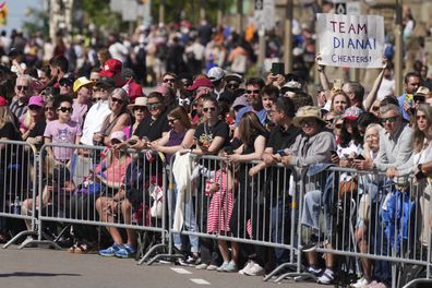 Crowds of people wait for the arrival of King Charles and Queen Camilla in Ottawa