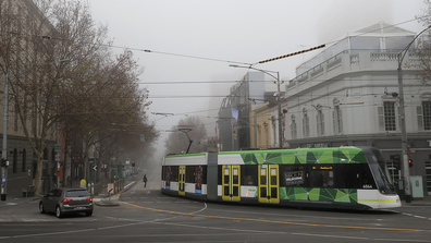 Fog is seen over the the top end of Bourke St on July 17, 2020 in Melbourne, Australia. Metropolitan Melbourne and the Mitchell shire are currently in lockdown following the rise in COVID-19 cases through community transmissions. 