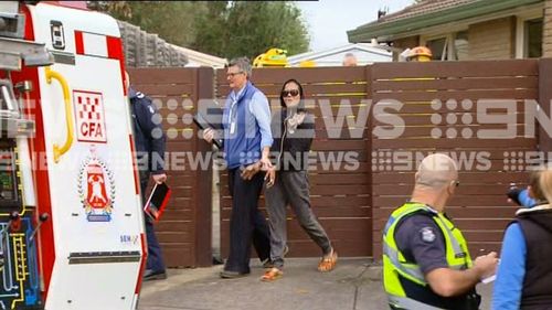 A woman has been arrested after a house fire in Melbourne's south-east.