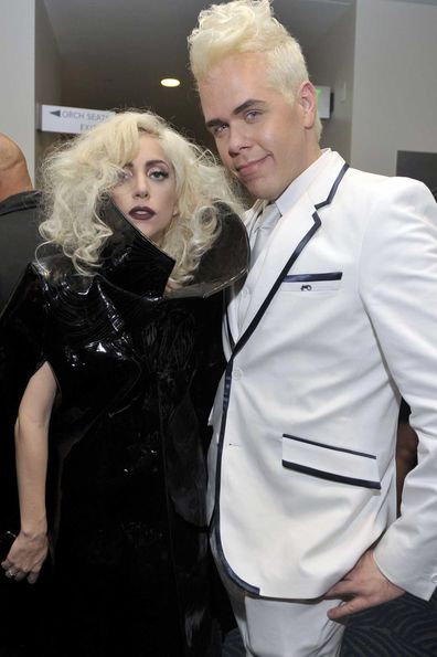 Lady Gaga and Perez Hilton pose backstage at the 2009 American Music Awards.